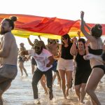 Durban Peachy Beach Party. Many people in Durban dancing on the beach having fun. EbonyModex girls event run by LoveDurban.co.za Tourist information and what's on in durban events guide. Durban South Africa