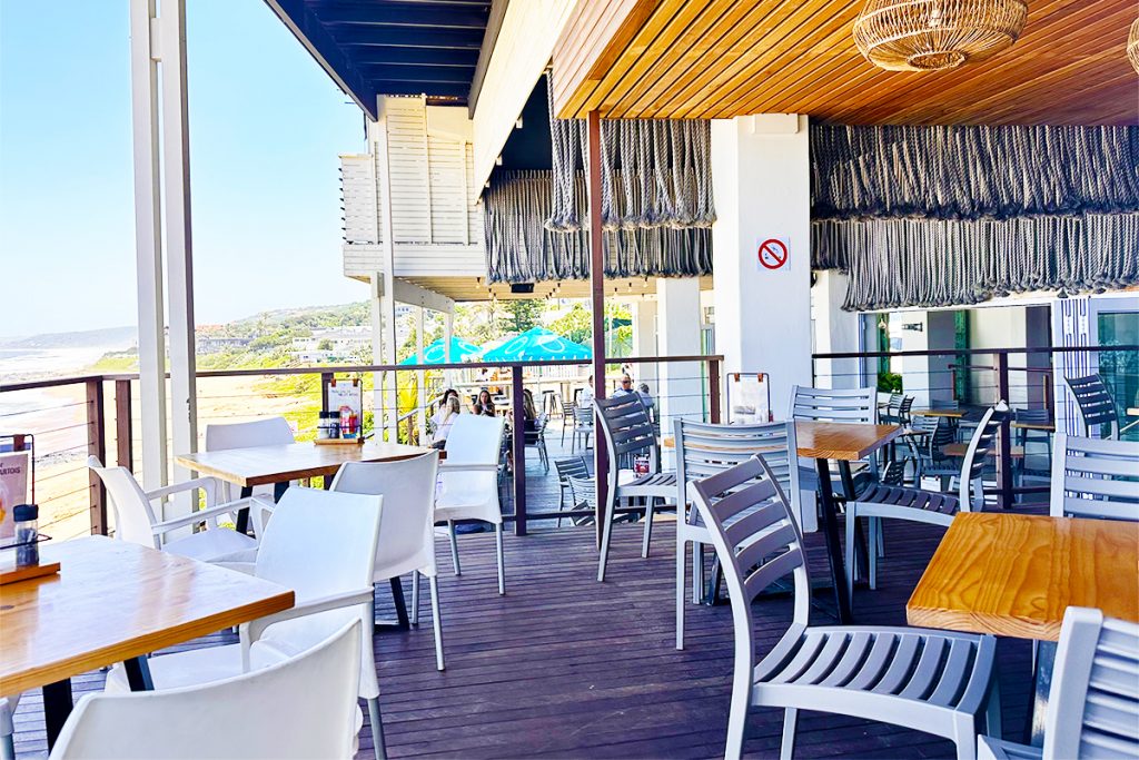 Sea view seating area at Surf Riders Cafe in Durban South Africa as featured on the Lovedurban.co.za what's on in durban and Durban tourist information website
